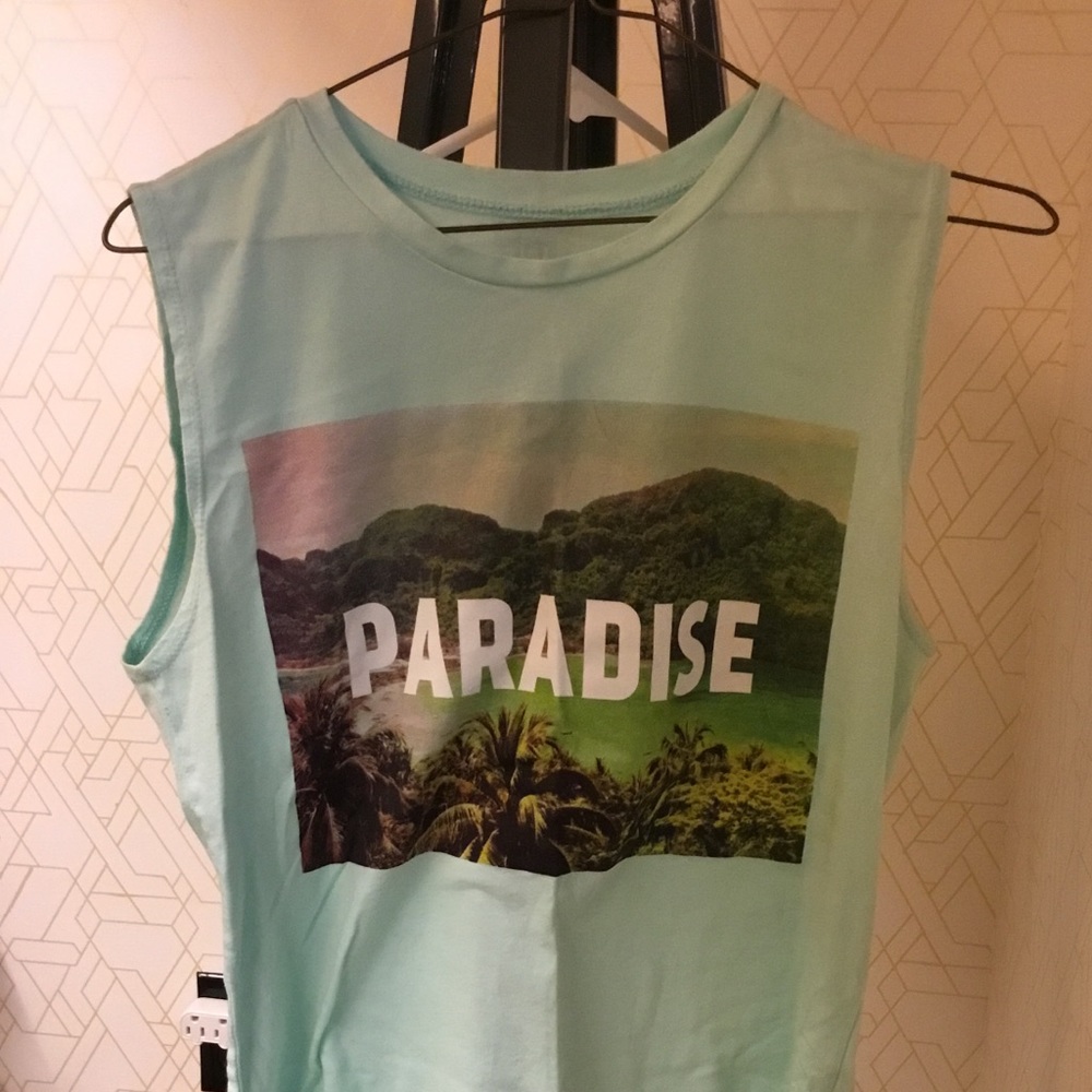 Light sea foam green muscle shirt. Size small.